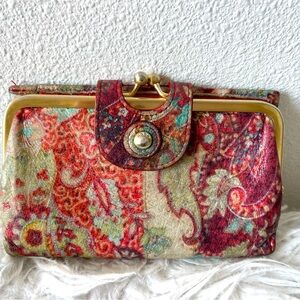 Boho wallet, has a vintage style floral vibe to it
